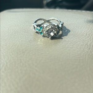 Elegant Silver and Blue Infinity Ring